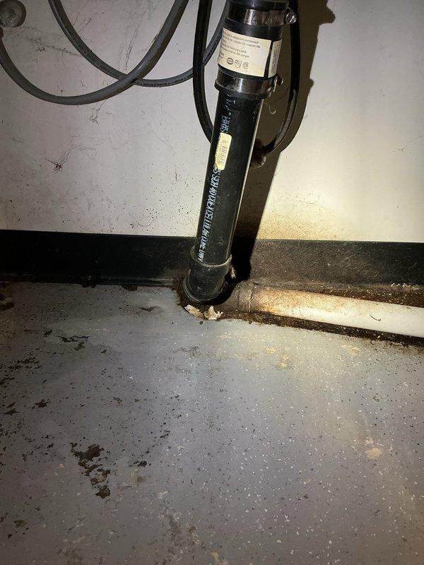 Responded to a clogged floor drain at a residential property constructed in 1970. Successfully snaked out the drain line to restore proper flow and drainage. The floor drain, located in the basement shower area near water filtration equipment, was cleared of blockage using mechanical cable equipment, and system was tested to confirm full functionality upon completion.