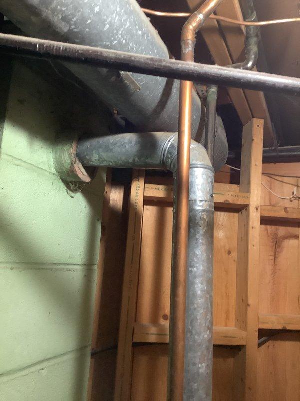 Responded to service call for non-functioning blower motor on aging furnace system. Conducted thorough assessment of existing HVAC equipment and associated ductwork, piping, and mechanical components in basement installation. Documented current system condition including deteriorated unit housing, aged supply and return ductwork connections, and existing copper refrigerant lines. Prepared comprehensive replacement estimate for complete furnace system upgrade due to equipment age and blower motor failure making repair cost-prohibitive compared to full system replacement.