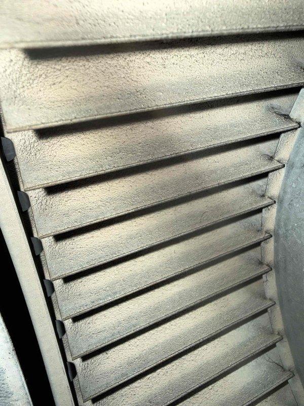 Completed MVP cooling maintenance visit on 12-year-old system. Upon inspection, discovered evaporator coil completely frozen with heavy ice buildup, indicating airflow restriction or refrigerant issue. Inspected indoor furnace unit and associated ductwork in utility area; noted system configuration and overall equipment condition. Addressed frozen coil condition and discussed outdoor unit cleaning requirements with customer per their original request, reviewing scope and pricing for exterior condenser cleaning services.