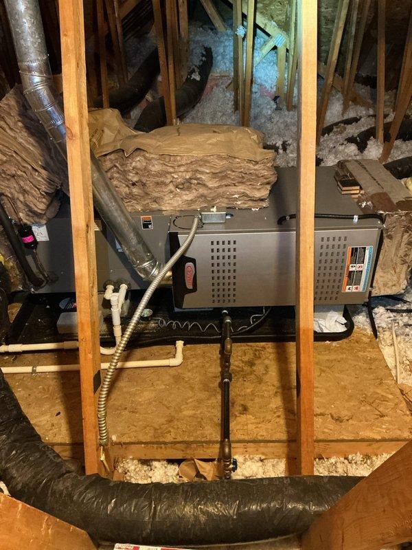Completed MVP air conditioning maintenance on dual-zone system with attic-mounted air handlers and two exterior Lennox condensing units. Performed comprehensive inspection of all equipment, verified proper operation of both zones, checked refrigerant levels, cleaned condenser coils, inspected ductwork and connections, and confirmed electrical components functioning within specifications.
