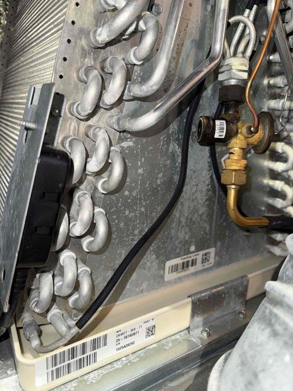 Completed annual maintenance on 1-year-old residential air conditioning system. Performed comprehensive inspection of evaporator coil, heat exchanger, gas valve connections, and associated HVAC components. All equipment found operating within normal parameters with minimal dust accumulation consistent with system age.