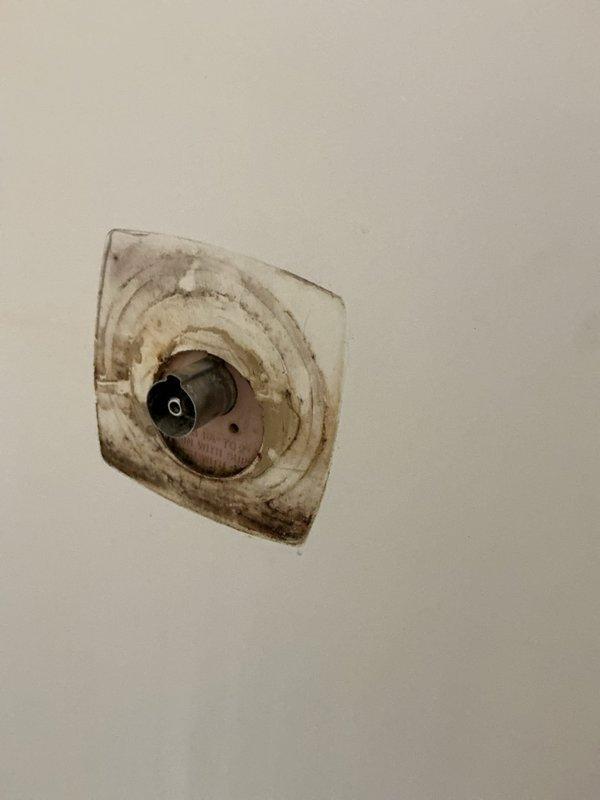 Replaced chrome tub spout and faucet handle assembly in main bathroom bathtub. Addressed frozen/seized shower handle in master bathroom by disassembling valve trim, applying penetrating lubricant to cartridge mechanism, and restoring full operational function to temperature control handle.