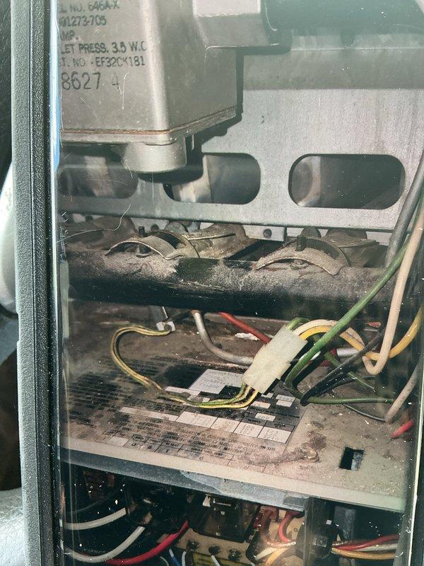 Completed preventive maintenance on 15+ year old air conditioning system. Performed visual inspection of furnace interior components, noting significant dust and dirt accumulation on burner assembly and control board. Utilized digital clamp meter to verify electrical readings and system performance parameters within acceptable ranges.