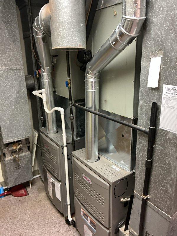 Completed sequential replacement of two air conditioning systems with evaporator coils for a veterinary facility, ensuring continuous cooling capacity throughout the installation process. Installed both outdoor condenser units on concrete pads with proper electrical disconnects and line set connections, and replaced corresponding indoor evaporator coils integrated with the existing furnace system. All ductwork, refrigerant lines, condensate drainage, and electrical connections were properly installed and tested to manufacturer specifications, providing the facility with reliable dual-zone cooling capability.