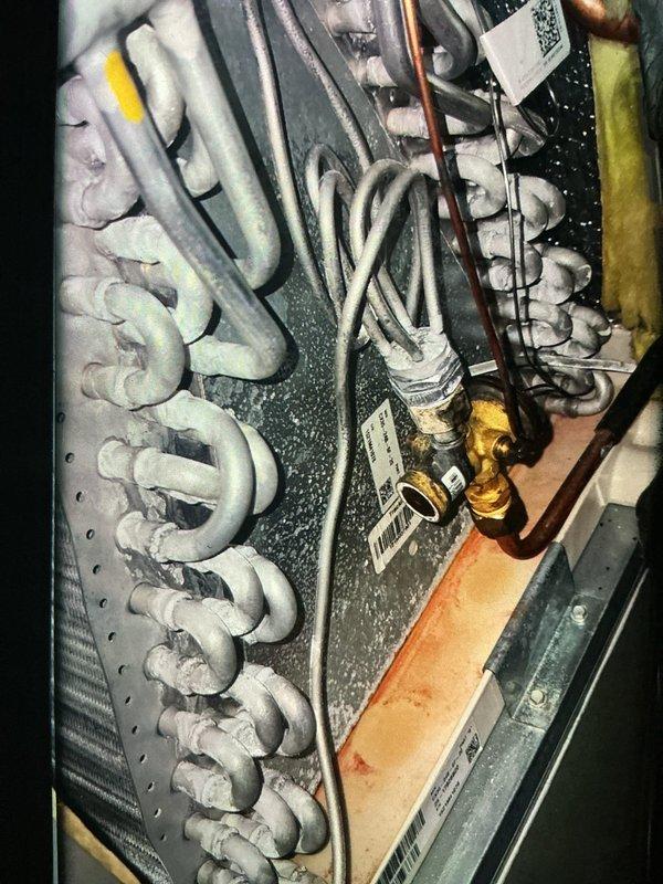 Completed routine MVP cooling maintenance visit on a 4-year-old system at 8am. Performed comprehensive inspection of evaporator coil assembly, refrigerant lines, and associated components. All copper piping connections, valves, and insulation materials were examined and found to be in satisfactory operating condition with normal age-related wear patterns observed.