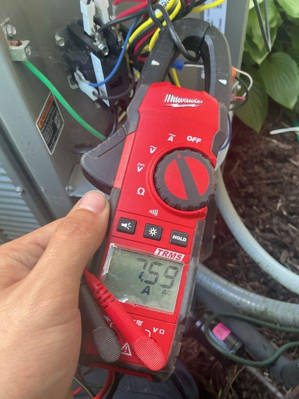 Completed routine cooling season maintenance on a 2-year-old air conditioning system. Performed electrical diagnostics measuring 7.55 amps at the outdoor unit contactor, inspected condenser wiring and connections, and evaluated a used air filter showing normal dust accumulation. All components operating within normal parameters with no immediate service needs identified.