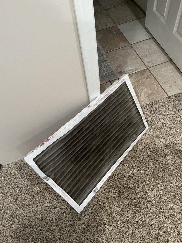 Completed routine cooling season maintenance on a 2-year-old air conditioning system. Performed electrical diagnostics measuring 7.55 amps at the outdoor unit contactor, inspected condenser wiring and connections, and evaluated a used air filter showing normal dust accumulation. All components operating within normal parameters with no immediate service needs identified.
