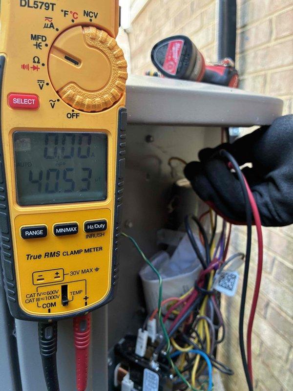 Completed preventive maintenance cooling visit on 7-year-old residential air conditioning system. Performed comprehensive electrical diagnostics using digital clamp meter to verify proper amperage draw and system voltage at outdoor condensing unit. Inspected all electrical connections within control panel, checking wire integrity and terminal tightness. All electrical parameters tested within manufacturer specifications with no abnormal readings detected. Noted vegetation growth around unit base and between louvers; cleared debris to ensure proper airflow and prevent future efficiency loss. Unit operating normally with adequate cooling capacity upon completion of maintenance service.