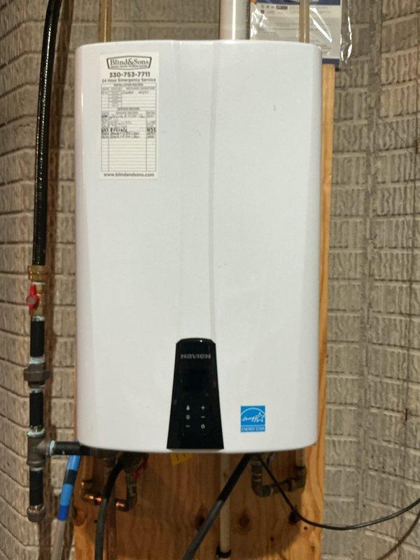 Performed annual descaling maintenance on a 7-year-old Navien tankless water heater unit. Flushed system with descaling solution to remove mineral buildup and restore optimal heat exchanger efficiency, ensuring continued reliable hot water delivery and extending equipment lifespan.