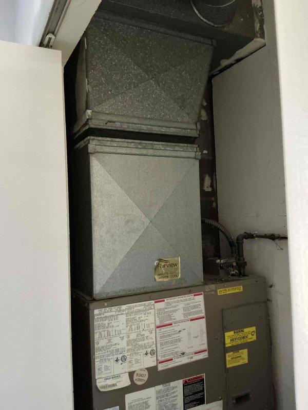 Conducted on-site estimate for Magic Pak HVAC system replacement in third-floor unit. Inspected existing vertical stack system consisting of furnace and air handler installed in confined utility closet space. Documented current equipment configuration, manufacturer specifications, and installation conditions through photographic assessment. Discussed equipment replacement options, pricing considerations, warranty coverage details, and price matching policy with customer to provide comprehensive quote for new Magic Pak system installation.