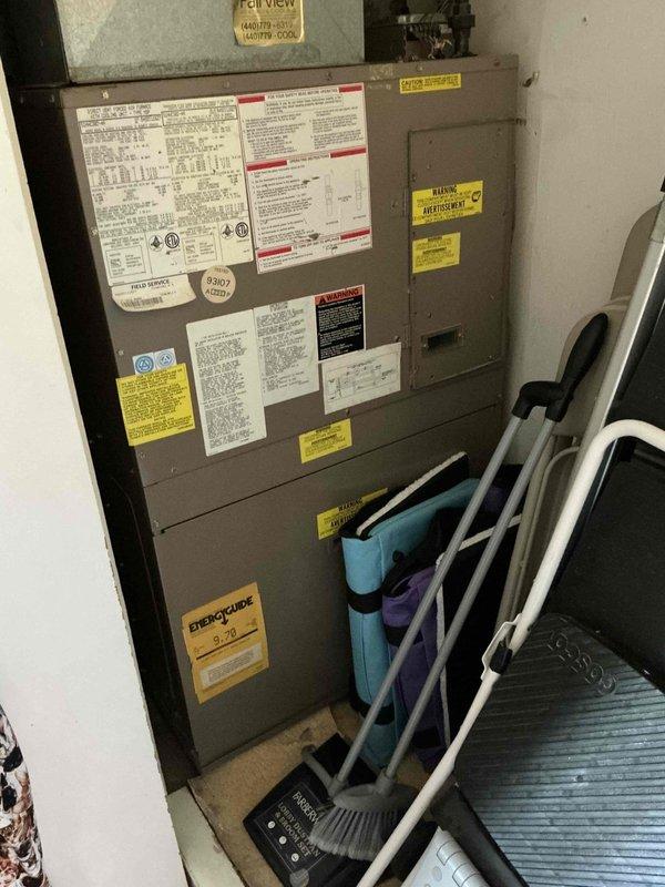 Conducted on-site estimate for Magic Pak HVAC system replacement in third-floor unit. Inspected existing vertical stack system consisting of furnace and air handler installed in confined utility closet space. Documented current equipment configuration, manufacturer specifications, and installation conditions through photographic assessment. Discussed equipment replacement options, pricing considerations, warranty coverage details, and price matching policy with customer to provide comprehensive quote for new Magic Pak system installation.