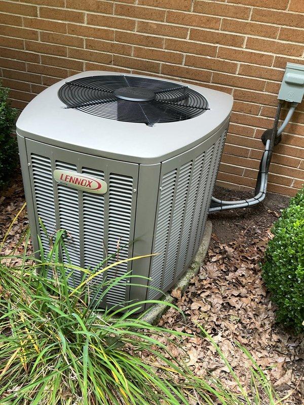 Performed preventative maintenance on Lennox residential cooling system. Inspected outdoor condensing unit, verified proper electrical readings using digital multimeter, and confirmed system operation. Unit found in satisfactory condition with no immediate repairs required.