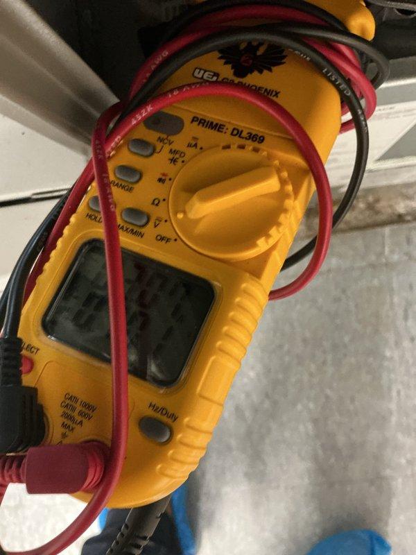 Performed preventative maintenance on Lennox residential cooling system. Inspected outdoor condensing unit, verified proper electrical readings using digital multimeter, and confirmed system operation. Unit found in satisfactory condition with no immediate repairs required.