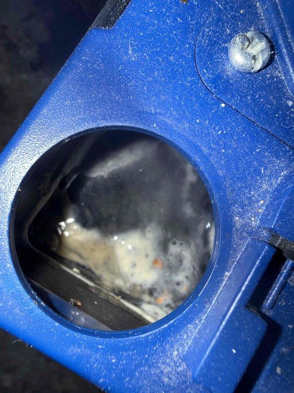 Completed scheduled MVP cooling maintenance visit on 4-year-old HVAC system. Upon inspection, identified debris accumulation along ductwork seam joints and dust buildup on blower housing components. Observed moisture and particulate matter inside blower assembly access port, indicating potential condensate drainage concerns. Documented system condition through photographic evidence showing ductwork junction points and blower compartment interior for maintenance records.