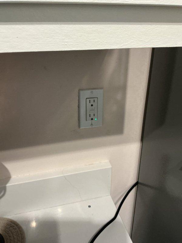 Responded to service call for kitchen outlet repeatedly tripping when refrigerator was in use. Inspected existing GFCI-protected outlet and determined circuit was overloaded due to multiple high-draw appliances sharing the same branch circuit. Verified GFCI functionality and confirmed proper operation of safety features. Provided estimate for installation of dedicated outlet circuit to accommodate refrigerator load separately from other kitchen appliances, which will prevent nuisance tripping and ensure code-compliant electrical distribution for the space.