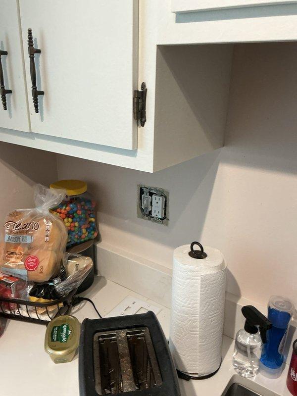 Responded to service call for kitchen outlet repeatedly tripping when refrigerator was in use. Inspected existing GFCI-protected outlet and determined circuit was overloaded due to multiple high-draw appliances sharing the same branch circuit. Verified GFCI functionality and confirmed proper operation of safety features. Provided estimate for installation of dedicated outlet circuit to accommodate refrigerator load separately from other kitchen appliances, which will prevent nuisance tripping and ensure code-compliant electrical distribution for the space.