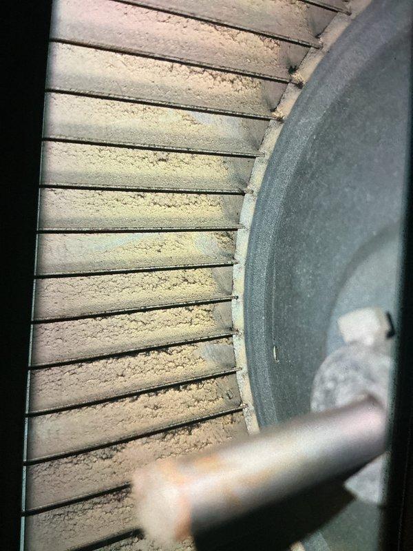 Completed maintenance inspection on 12-year-old cooling system. Found significant dust and debris accumulation on evaporator coil fins requiring attention. Evaluated Ecobee thermostat control wiring and determined potential thermostat replacement may be necessary for optimal system performance. Documented equipment condition with photos and scheduled callback for follow-up service.