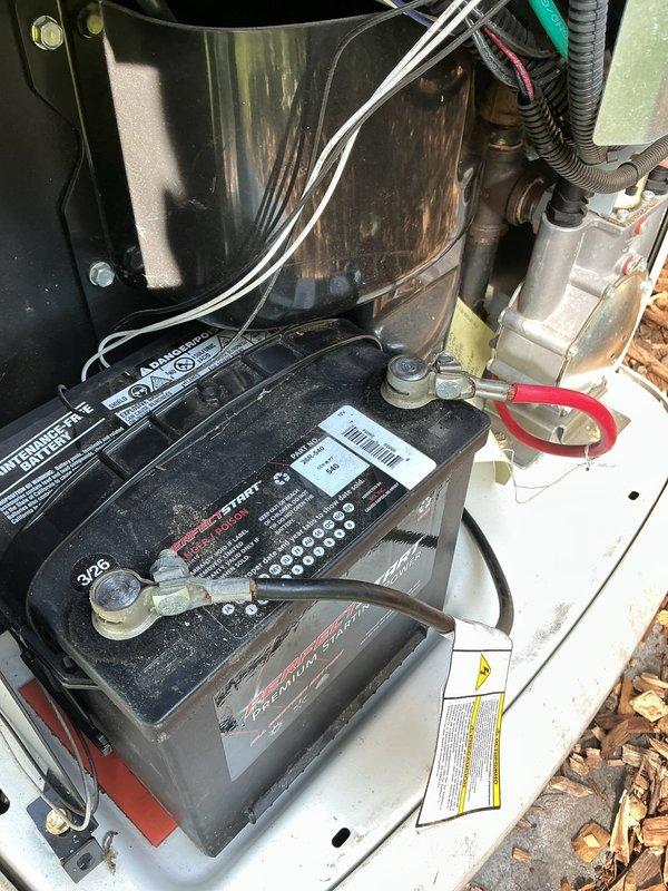 Performed scheduled maintenance on a 3-year-old Generac 22kW standby generator, model GD070422. Replaced the existing battery with a new unit as requested due to age and declining performance. Conducted comprehensive system inspection including verification of all electrical connections, fluid levels, and operational parameters. Tested generator startup sequence and confirmed proper voltage output at 120/240V single-phase specifications. Verified both natural gas and LP fuel system pressures and connections were secure. Cleaned battery terminals and compartment area, ensuring all cable connections were tight and properly routed. Documented unit specifications and confirmed serial number 3011848082 for maintenance records. Generator tested successfully and left in operational standby mode.