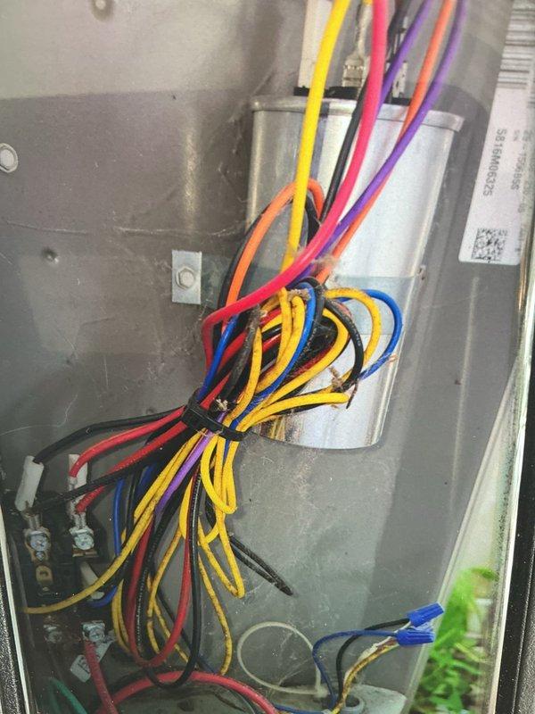 Completed preventive maintenance cooling visit on 9-year-old air conditioning system. Performed comprehensive inspection of HVAC unit including electrical connections, wiring harness, and control panel components. All electrical terminals found secure with proper wire routing and bundling. Verified system operational status and documented equipment condition through photographic records for maintenance history.
