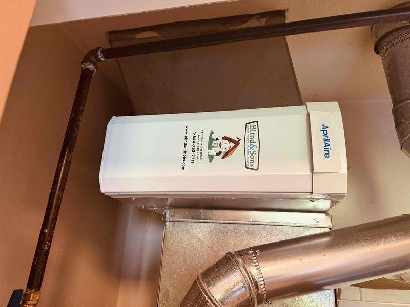 Responded to warranty callback for recently installed HVAC system that failed home inspection. Upon arrival, identified and corrected unlevel outdoor AC condenser unit on deck. Relocated refrigerant lines that were blocking access to the Aprilaire air filtration system, allowing proper filter removal and replacement. Verified air cleaning unit installation and confirmed all components are now accessible for routine maintenance. System evaluated and brought into compliance with inspection requirements.