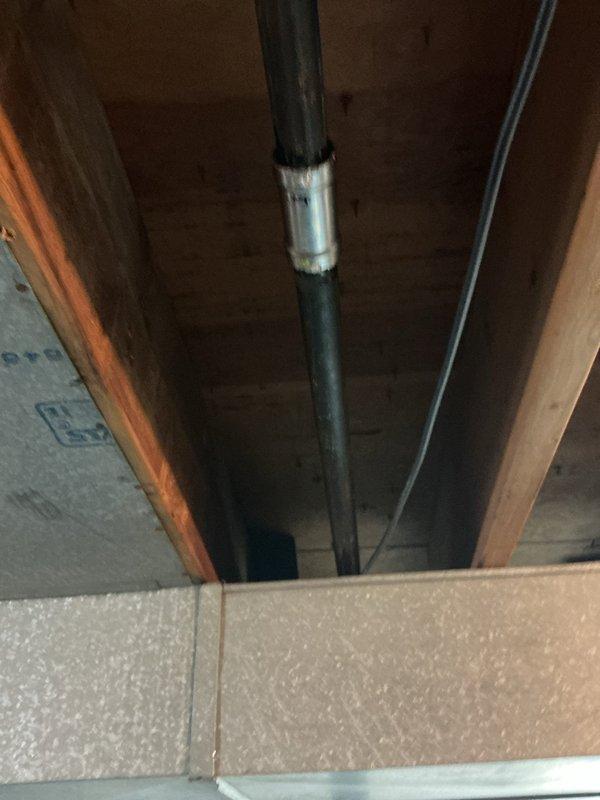 Repaired leaking gas main line in basement by cutting out compromised sections of the existing 1 1/2" trunk line and replacing with new 1" gas piping and fittings. Removed old connections, installed new piping sections with proper couplings, and secured all joints to code specifications to restore safe gas flow throughout the home.