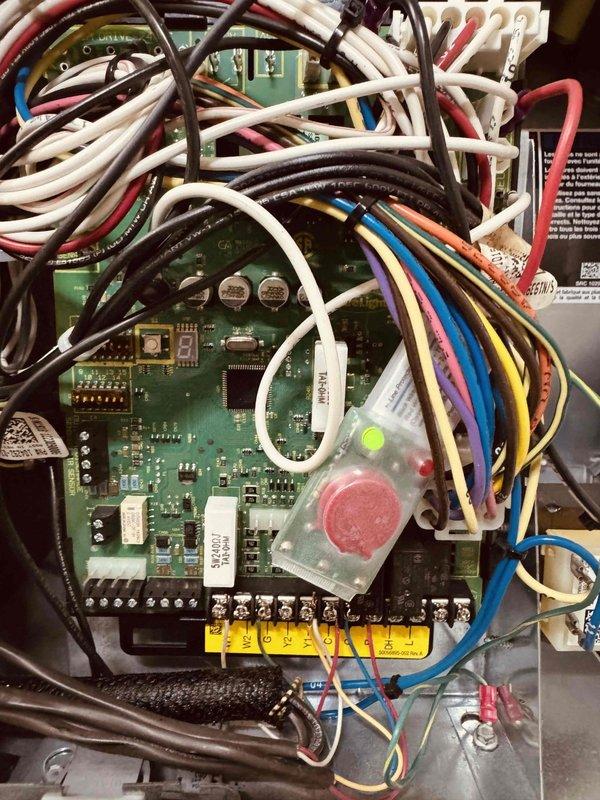 Completed maintenance service on a 7-year-old cooling system. Upon inspection, found significant accumulation of dirt, dust, and debris throughout the unit cabinet and on internal components. Cleaned control board area, electrical connections, and interior surfaces. Verified all wire connections at terminal blocks and control board were secure. Tested system operation and confirmed proper functionality of all electrical components and controls. Unit is due for service contract renewal.