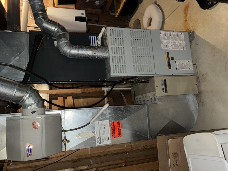 Completed routine cooling maintenance visit on residential HVAC system approximately 5+ years old. Performed standard inspection of outdoor condensing unit and indoor air handler, documenting equipment condition with photos showing electrical components, wiring connections, and overall system configuration. All accessible components were evaluated for proper operation and seasonal readiness.