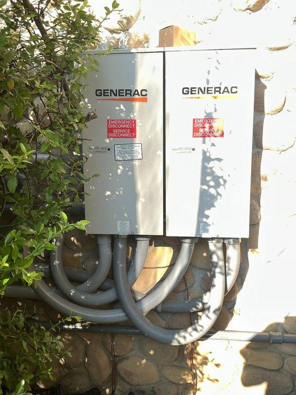 Responded to failed electrical inspection for Generac generator and transfer switch installation. Corrected code violations including separating unprotected service wires from feeder wires into separate raceways, properly strapping conduit and SER cable, replacing non-rated Romex connectors in wet locations with approved fittings, establishing proper grounding in garage disconnect with secure ground lug connections ensuring all wire strands seated under lugs, and installing connectors correctly into soft start controllers. All corrections made to meet electrical code requirements and pass inspection.