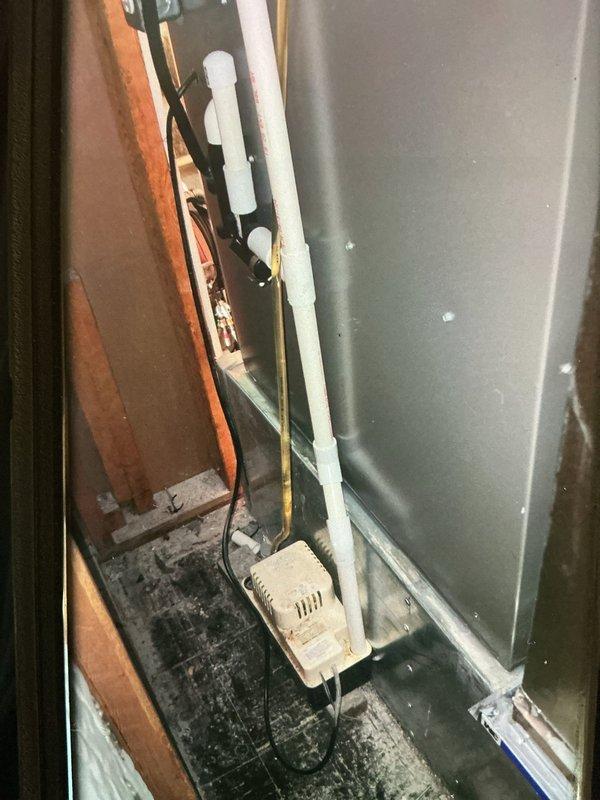Completed scheduled maintenance on a 6-year-old cooling system, including inspection of both indoor air handler unit located in attic space and outdoor condenser unit. Performed standard preventive maintenance procedures, assessed system components and electrical connections, and documented equipment condition with photographic records showing heavily soiled outdoor filter requiring attention.