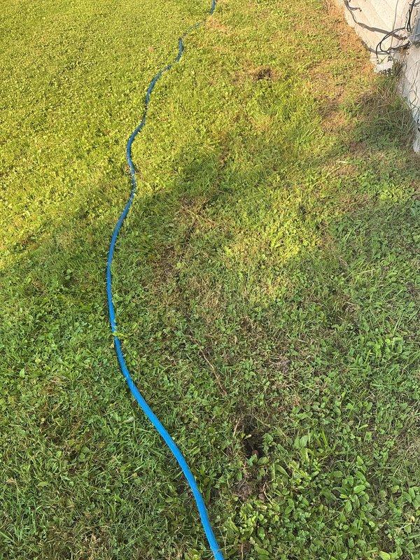 Completed follow-up visit to address failed electrical inspection requiring documentation of grounding system installation. Photographed two ground rods installed per code requirements to verify proper electrical grounding for the system. Submitted photographic evidence to inspector for approval to resolve outstanding inspection item and obtain final sign-off on electrical installation warranty work.