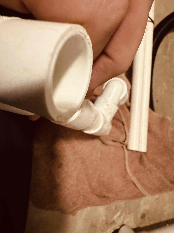Responded to callback regarding reported leak in air conditioning condensate drain line from recent installation. Upon inspection, identified issue with PVC drain line assembly and fittings. Evaluated drain line configuration, connections, and trap assembly to locate source of leak and made necessary corrections to resolve drainage concern.