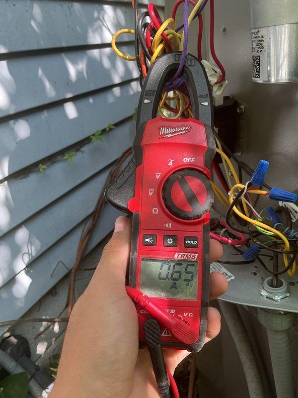 Completed routine maintenance visit on a 2-year-old air conditioning system. Inspected and replaced air filter, verified proper airflow through the system. Performed electrical diagnostics using clamp meter to measure amperage draw on compressor circuit, recording 0.55 amps, which falls within normal operating parameters. Checked all electrical connections at outdoor unit, inspected capacitor and compressor components for proper operation. System operating efficiently with no issues identified during this scheduled cooling season maintenance visit.