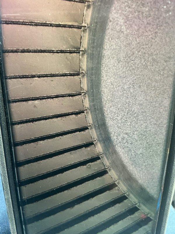 Completed seasonal AC tune-up on 9-year-old air conditioning system. Performed standard maintenance protocol including inspection of evaporator coil which showed dust accumulation on aluminum fins, checked condensate drain assembly noting corrosion present at drain fitting connection point, verified all electrical connections, tested system operation, and confirmed unit is functioning properly. System operational with no immediate repairs required.
