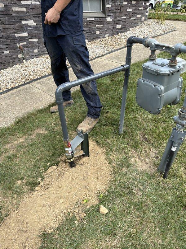 Installed new gas line from residential gas meter to pool heater, requiring trenching across yard to route piping underground. Coordinated equipment rental for trenching work and completed underground pipe installation with proper burial depth and code-compliant connections. Gas meter assembly was configured with appropriate shutoff valves and regulatory devices, and final connections were made to pool heater equipment with metallic conduit protection at termination point.