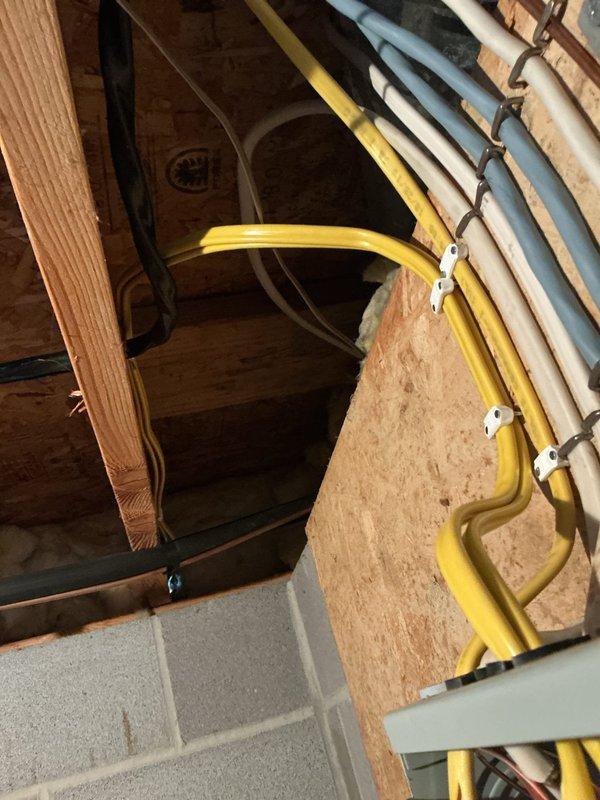 Installed a dedicated 20-amp GFCI-protected circuit for pool pump equipment with approximately 15 feet of underground conduit run from main panel through attic space to exterior pool area. Added code-required convenience outlet at pool equipment location. Completed comprehensive pool bonding system connecting copper grounding ring, pool equipment, skimmer, and four metal pool posts to ensure proper electrical safety per NEC requirements.