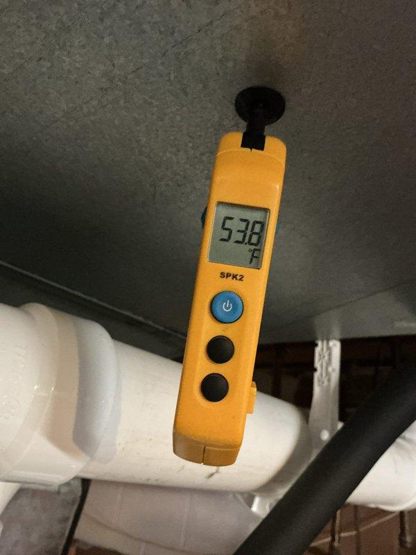 Completed MVP preventive maintenance cooling visit on 14-year-old air conditioning system. Inspected and tested dual element time-delay fuses rated at 45A 250V AC, verified proper electrical protection. Measured supply air temperature at 53.8°F, confirming adequate cooling performance and proper refrigerant charge for system age.