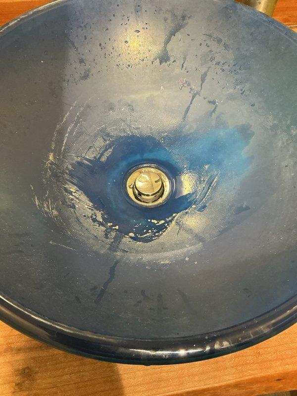 Replaced defective pop-up drain assembly on right side lavatory sink. Removed old drain fixture and installed new chrome pop-up assembly with proper sealing to prevent leaks. Verified proper operation of pop-up mechanism and tested drain flow to ensure complete functionality.
