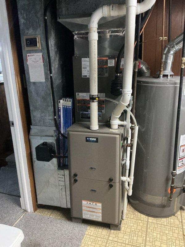 Completed annual cooling maintenance on Lennox outdoor condensing unit and York indoor furnace system. Performed comprehensive tune-up including inspection of all components, electrical connections, refrigerant levels, and airflow. System found operating properly with no deficiencies noted; all equipment functioning within normal parameters.