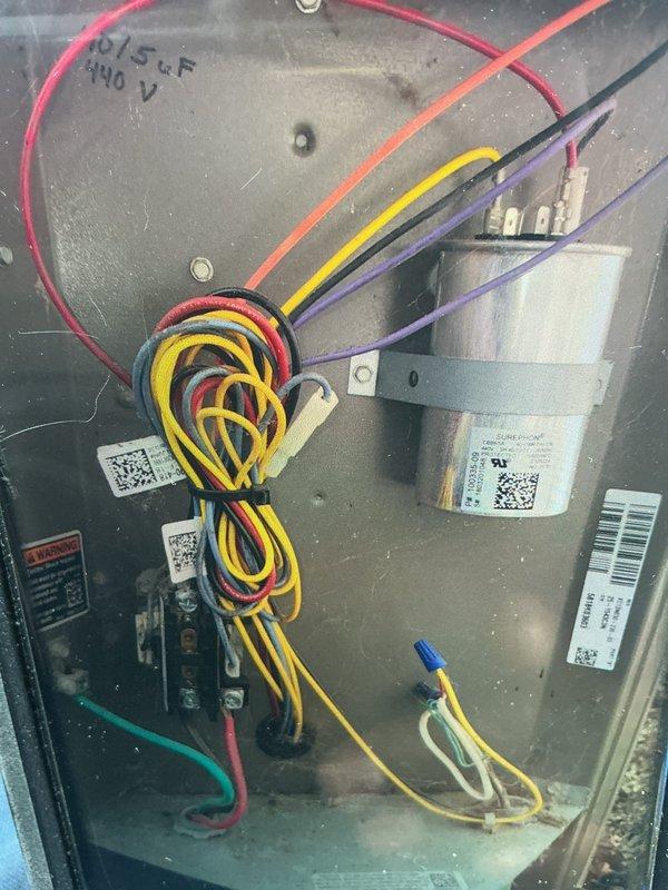 Completed routine maintenance visit on 7-year-old air conditioning system. Performed standard cooling season inspection including examination of blower motor assembly and electrical components. Inspected blower wheel, which showed dust accumulation on fins and surfaces. Evaluated capacitor and associated wiring connections, verifying proper electrical terminations and component mounting. Provided pricing information for coil cleaning service as requested.