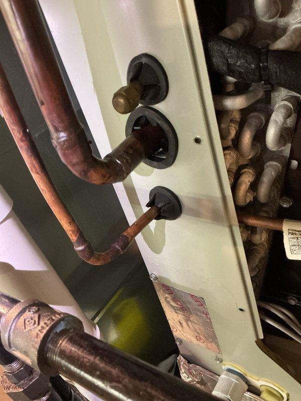 Completed scheduled BS-MVP cooling maintenance visit on 9-year-old outdoor unit. Performed comprehensive system inspection including refrigerant line connections, which showed age-appropriate oxidation on copper piping but remained structurally sound with proper sealing at grommets. All components operating within normal parameters with no immediate service needs identified.