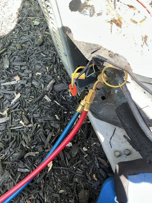 Responded to service call for 10-year-old air conditioning unit making abnormal noises. Upon arrival, unit was powered off by homeowner. Performed diagnostic evaluation using manifold gauges and refrigerant testing equipment to assess system pressures and operational status. Inspected exterior condensing unit, electrical disconnect, and associated components for mechanical issues, loose hardware, or signs of compressor or fan motor failure that could be causing the reported noise concern.