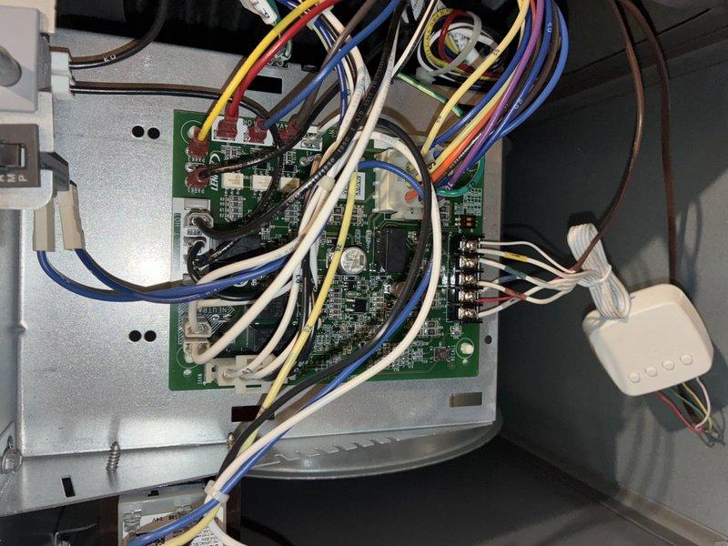 Completed routine maintenance on 5-year-old air conditioning system. Inspected control board wiring and connections, verified proper operation of electronic components and circuit boards. Examined evaporator coil and blower housing, noting normal dust accumulation consistent with system age and operation. All components functioning within normal parameters.