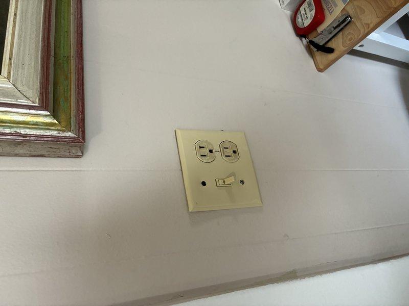 Replaced multiple electrical outlets throughout the residence, including installations in rooms with decorative wall finishes and living areas. All outlet replacements were completed to code specifications, ensuring proper grounding and secure mounting in existing junction boxes.