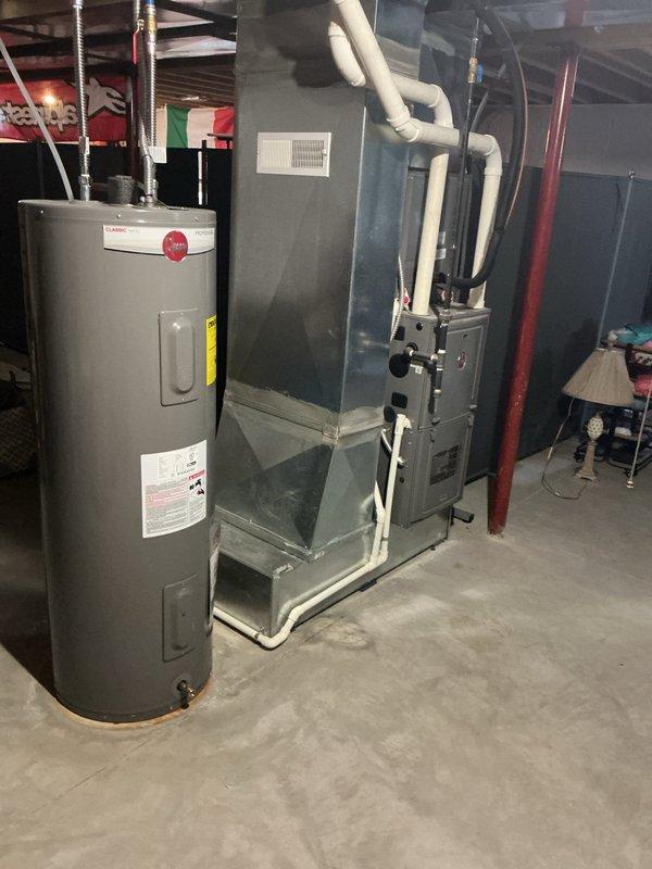 Responded to clogged drain issue at washing machine location where suds were backing up through the drain and overflowing down the wall. Inspected drainage system including standpipe and associated plumbing connections in the mechanical room area. Cleared obstruction from washing machine drain line to restore proper drainage and eliminate backup condition.