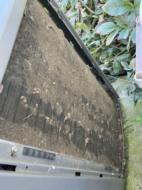 Completed routine cooling maintenance visit on 5-year-old system. Found outdoor condenser unit filter heavily soiled with thick accumulation of dirt, dust, and debris requiring cleaning. Equipment area showed significant vegetation overgrowth around condenser and associated components that was addressed to ensure proper airflow and system operation.