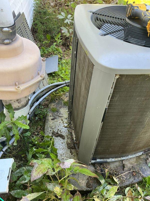 Completed routine cooling maintenance visit on 5-year-old system. Found outdoor condenser unit filter heavily soiled with thick accumulation of dirt, dust, and debris requiring cleaning. Equipment area showed significant vegetation overgrowth around condenser and associated components that was addressed to ensure proper airflow and system operation.