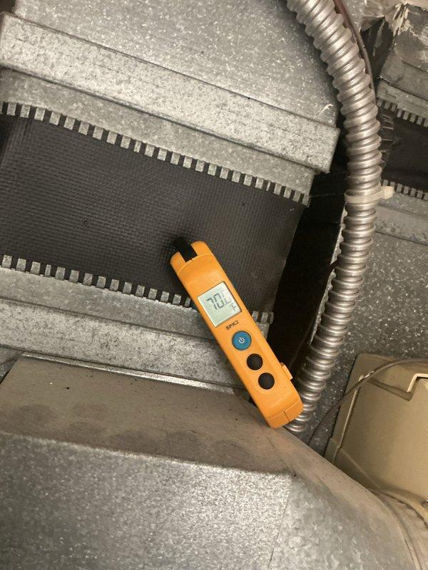 Completed MVP cooling maintenance visit on 3-year-old system. Inspected dual-run capacitor showing proper ratings of 40/5µF at 450V AC with all wire connections secure. Measured supply air temperature at 70°F and verified proper airflow through ductwork and insulation integrity in attic space.