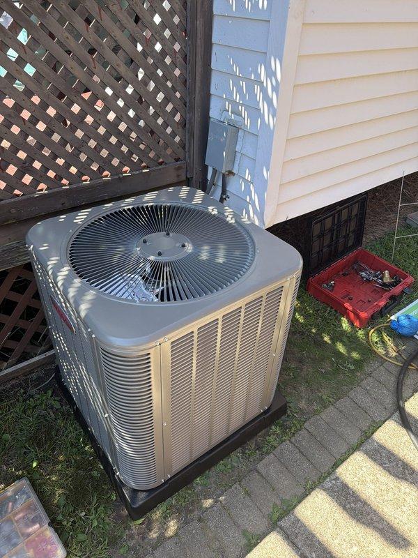 Completed full HVAC system installation featuring an 80% AFUE furnace and matching air conditioning condenser unit. Installed new outdoor condensing unit on composite pad with proper leveling and clearances, ran refrigerant linesets through exterior chase covered with protective panel, established electrical connections with appropriately rated Littelfuse fuses for equipment protection, and verified all mechanical and electrical components for proper operation. System tested and confirmed operational with adequate airflow and temperature differential.