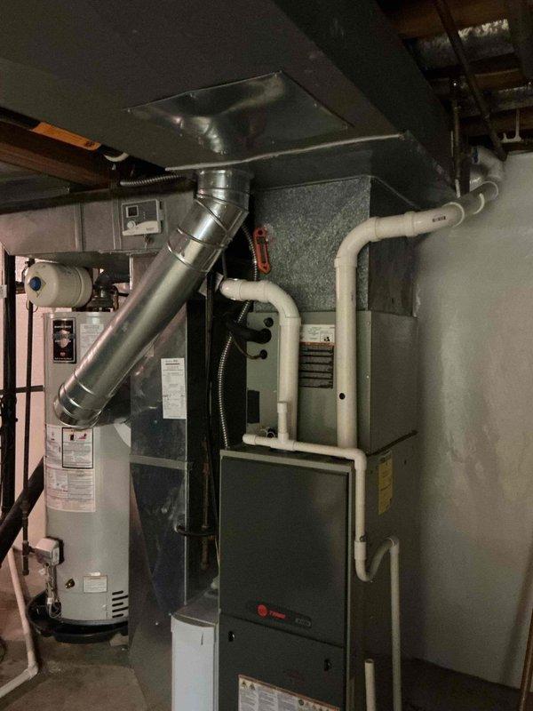 Completed MVP cooling maintenance visit on 16-year-old HVAC system. Performed comprehensive inspection of furnace, air handler, and associated ductwork in basement mechanical room. Verified proper operation of all components, checked condensate drain lines, and documented equipment condition with photos. System operating within normal parameters.