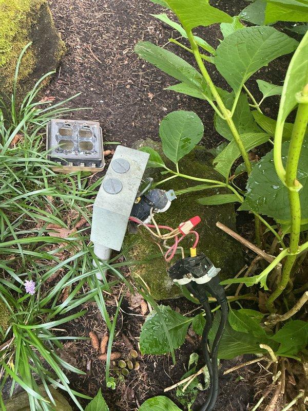 Responded to service call for non-functioning outdoor outlet near water feature. Traced circuit back to electrical panel, identified tripped GFCI breaker protection. Reset breaker, tested outdoor weatherproof receptacle for proper operation, and verified ground fault protection was functioning correctly to ensure safe operation in wet location environment.